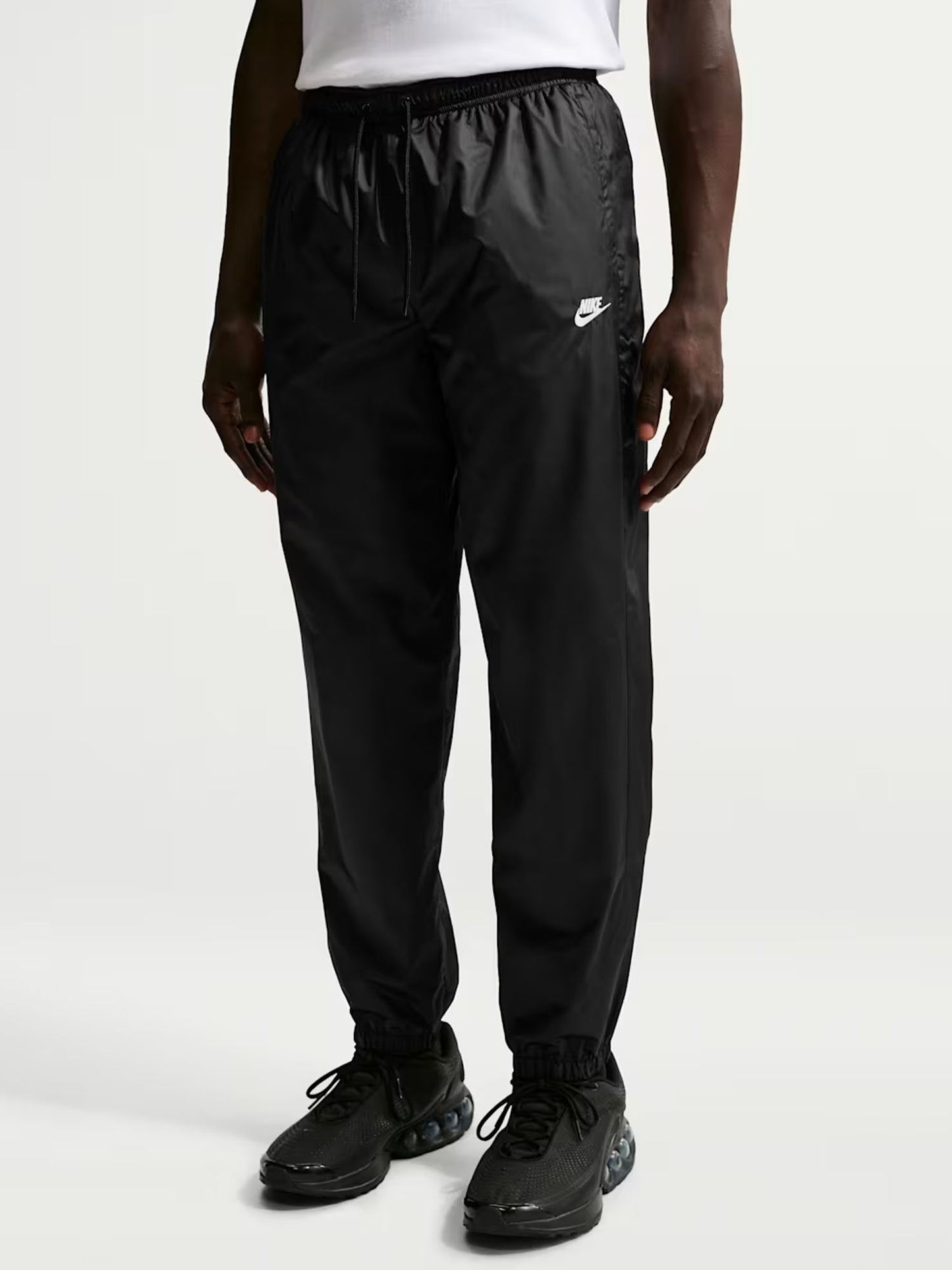 Pantaloni Windrunner Nike da uomo resistenti a vento e pioggia neri