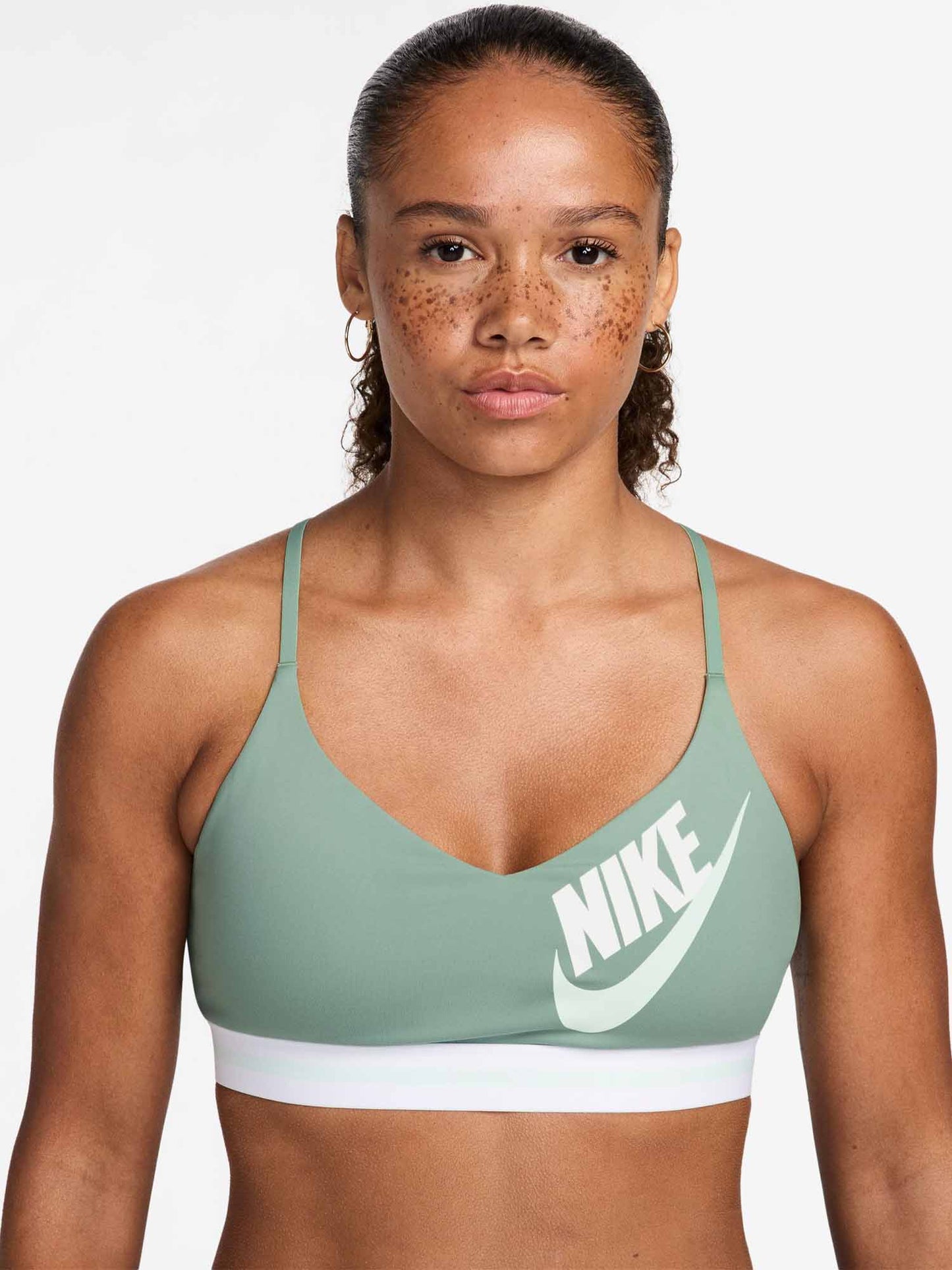 Nike Indy, canotta sportiva donna verde a supporto leggero