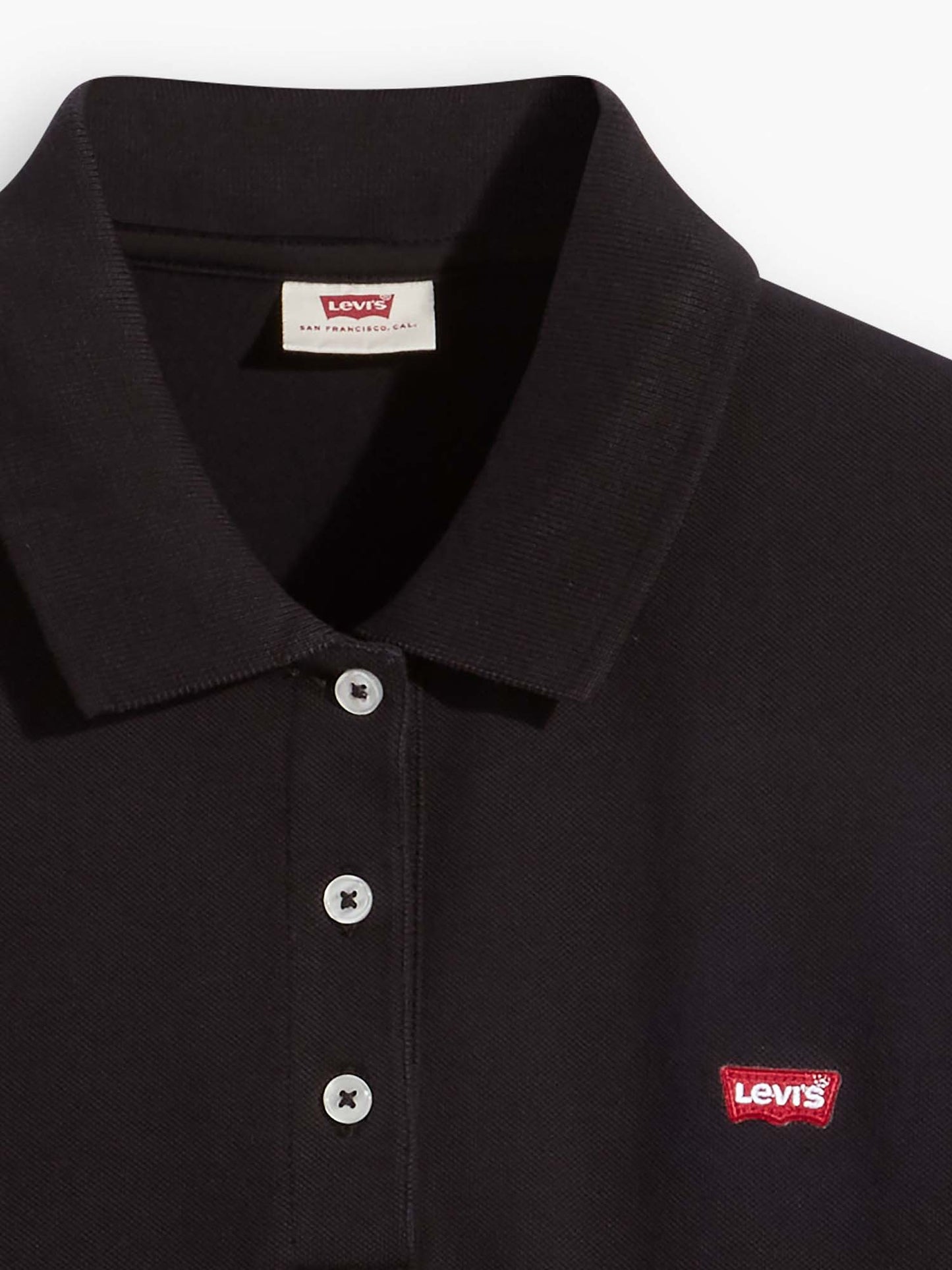 Polo slim donna Levi's nera, stile moderno e comfort