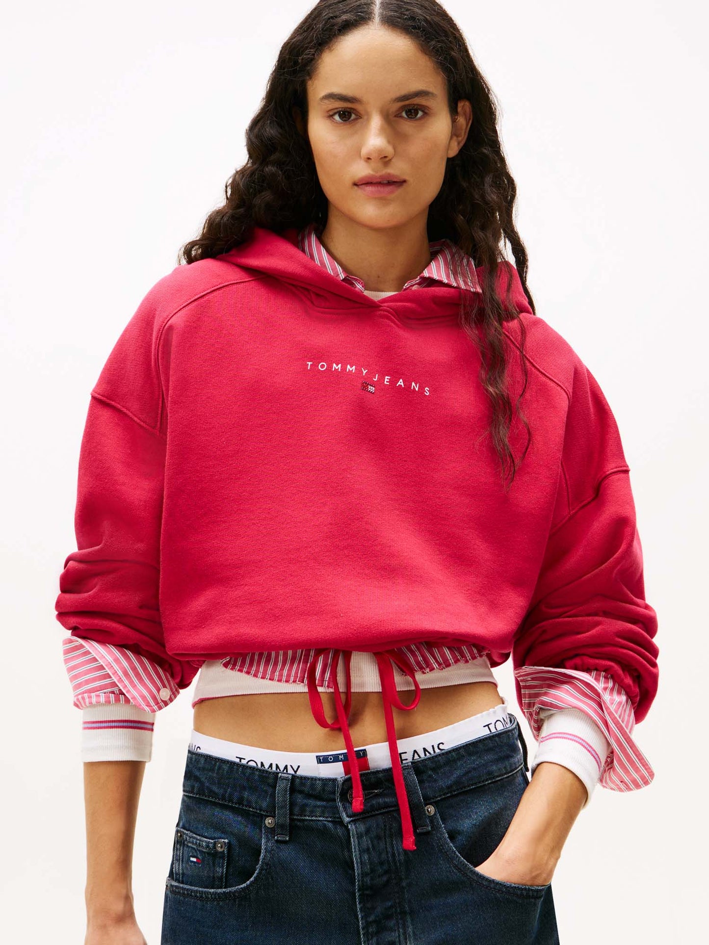 FELPA CROP CON CAPPUCCIO TOMMY JEANS DA DONNA FUXIA