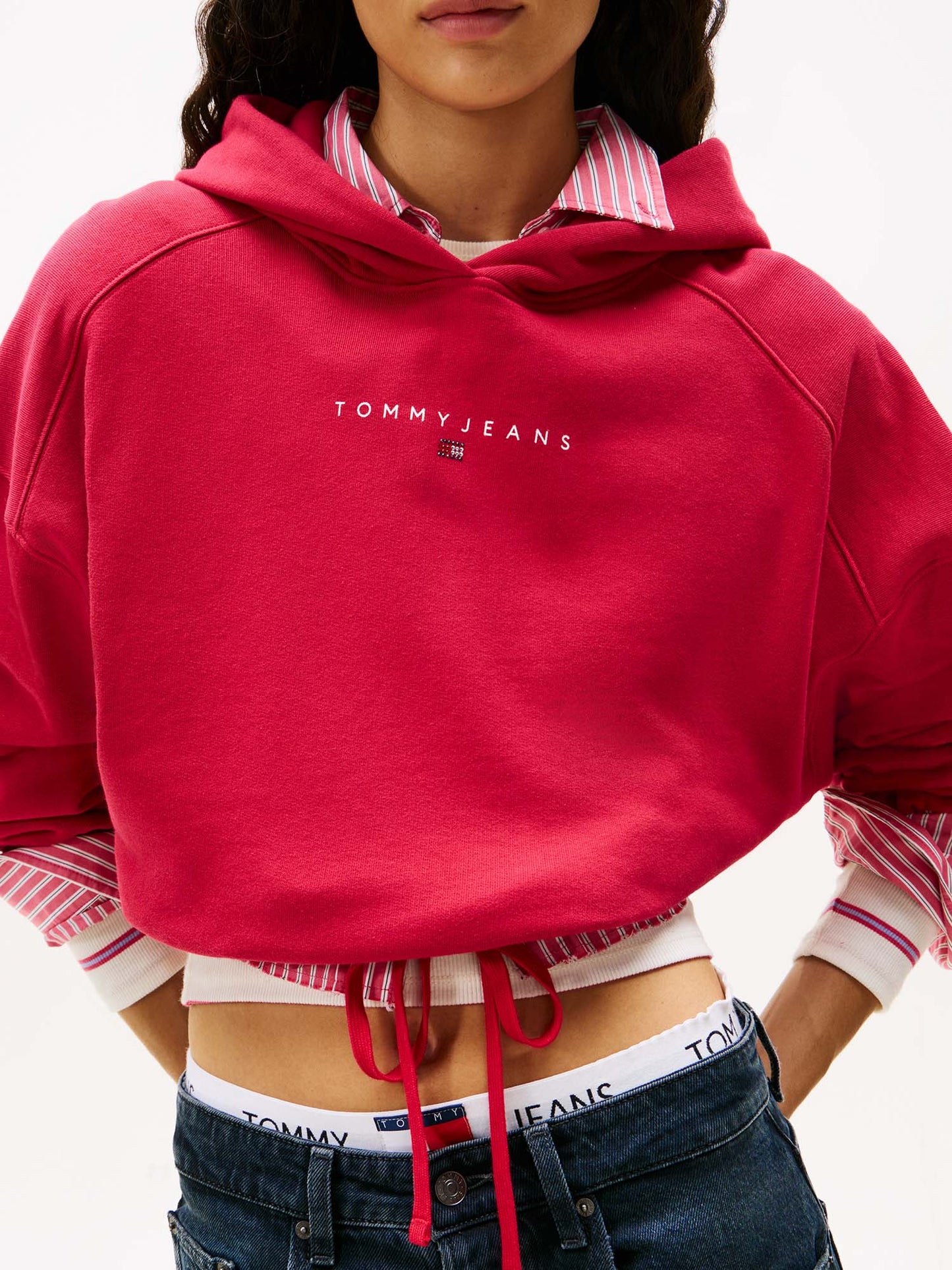 FELPA CROP CON CAPPUCCIO TOMMY JEANS DA DONNA FUXIA