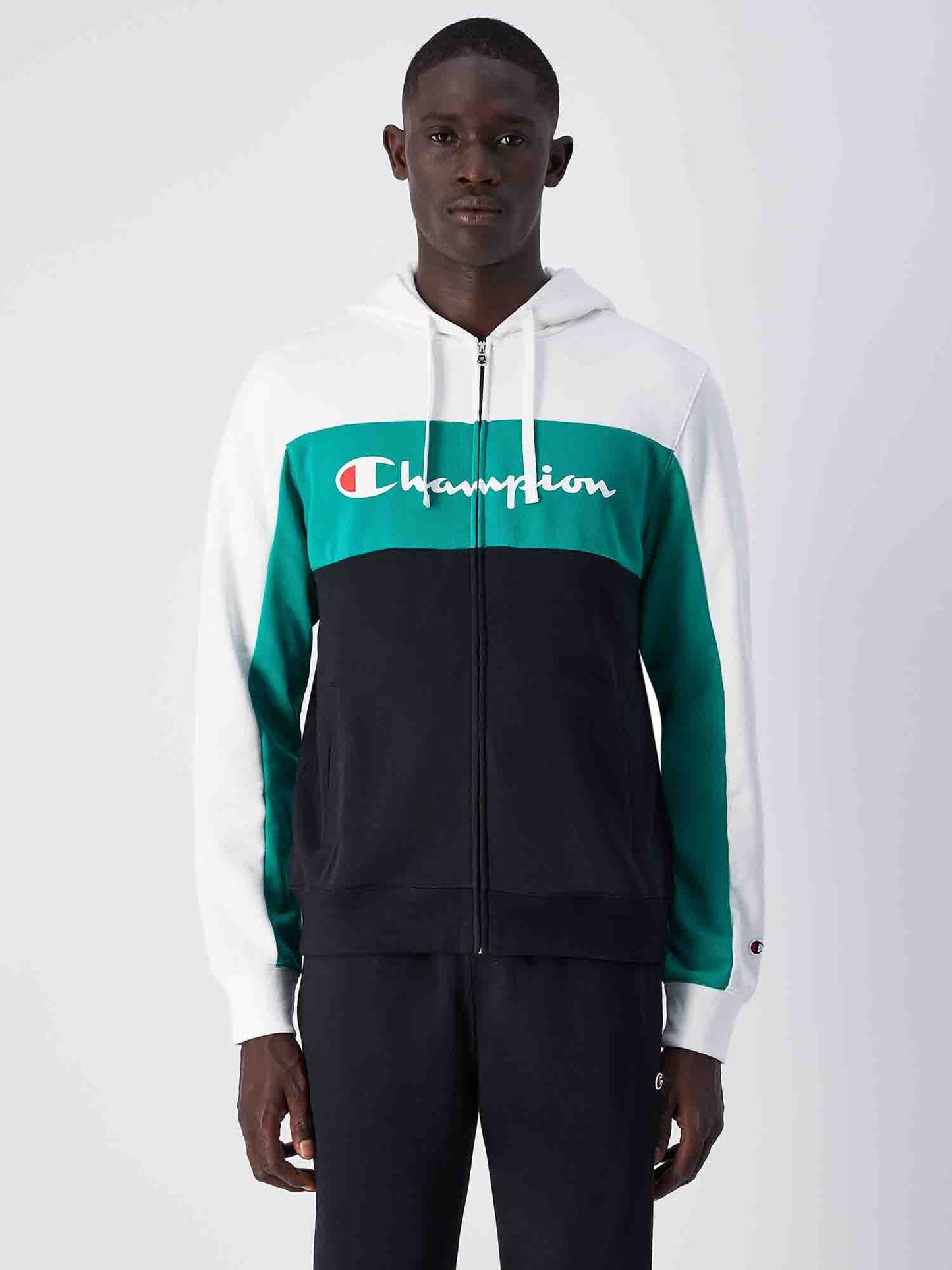 TUTA CHAMPION CON ZIP UOMO BIANCO-VERDE