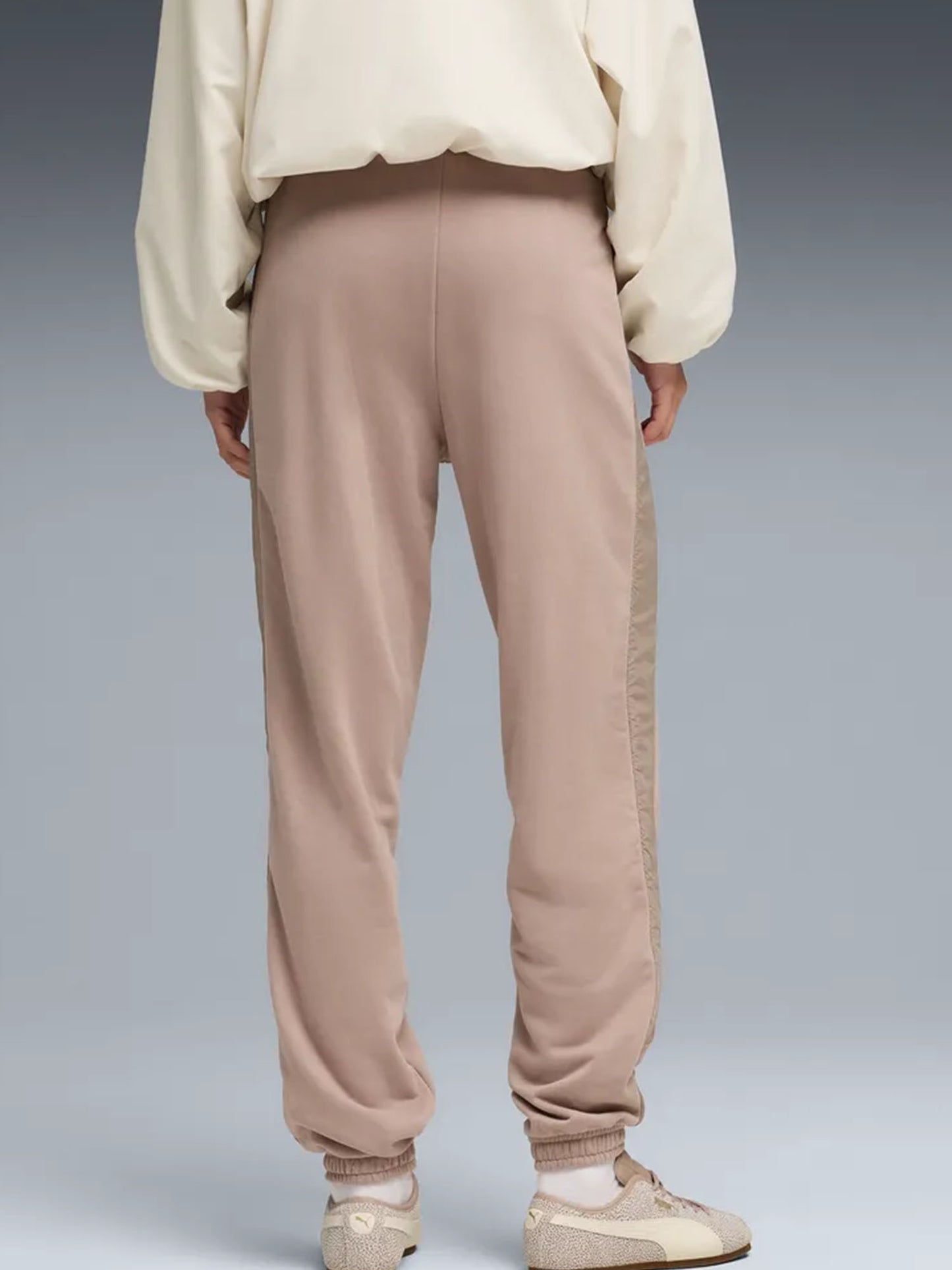 Pantaloni high-waist donna Puma HER beige dal design versatile