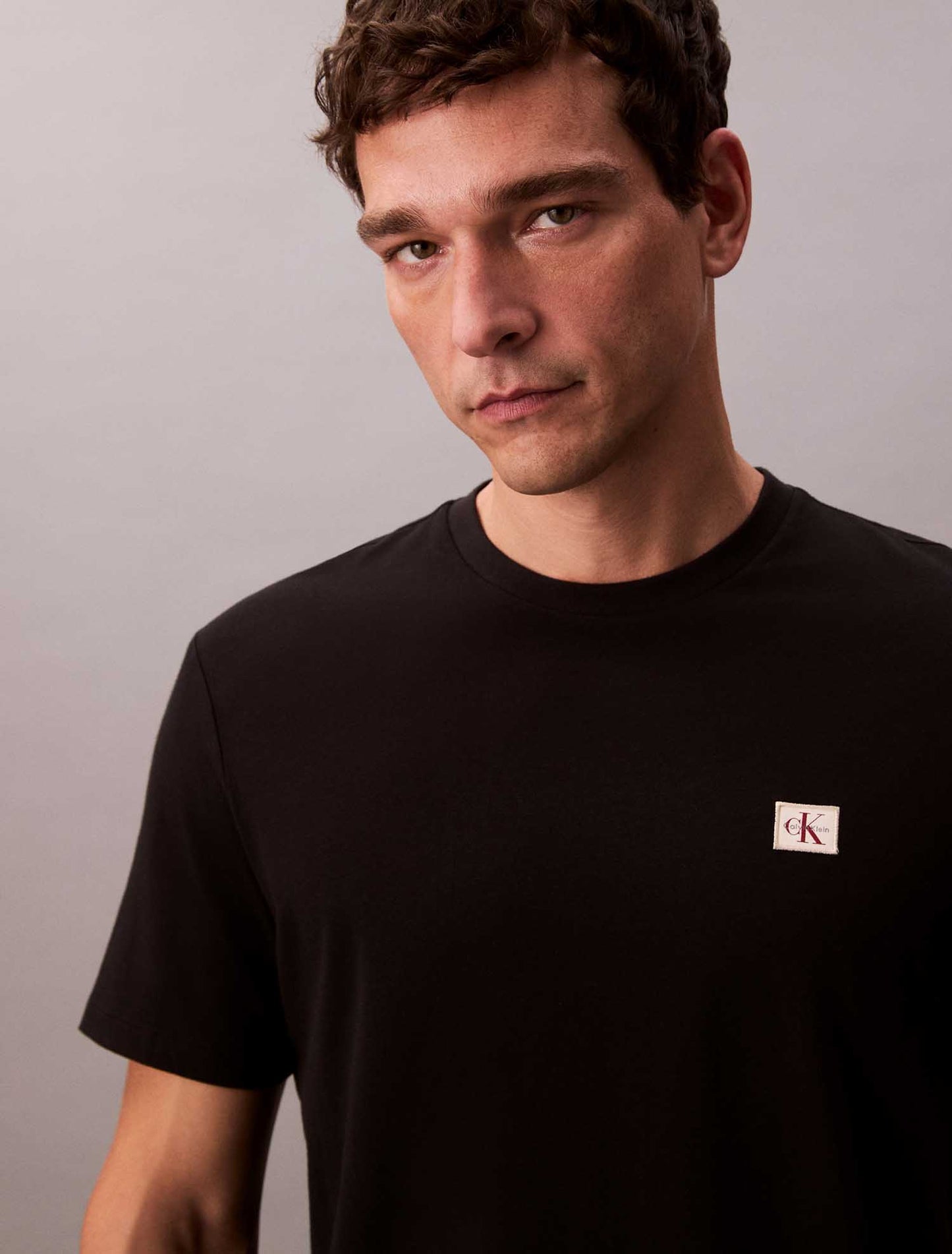 T-SHIRT BADGE CALVIN KLEIN JEANS DA UOMO NERO