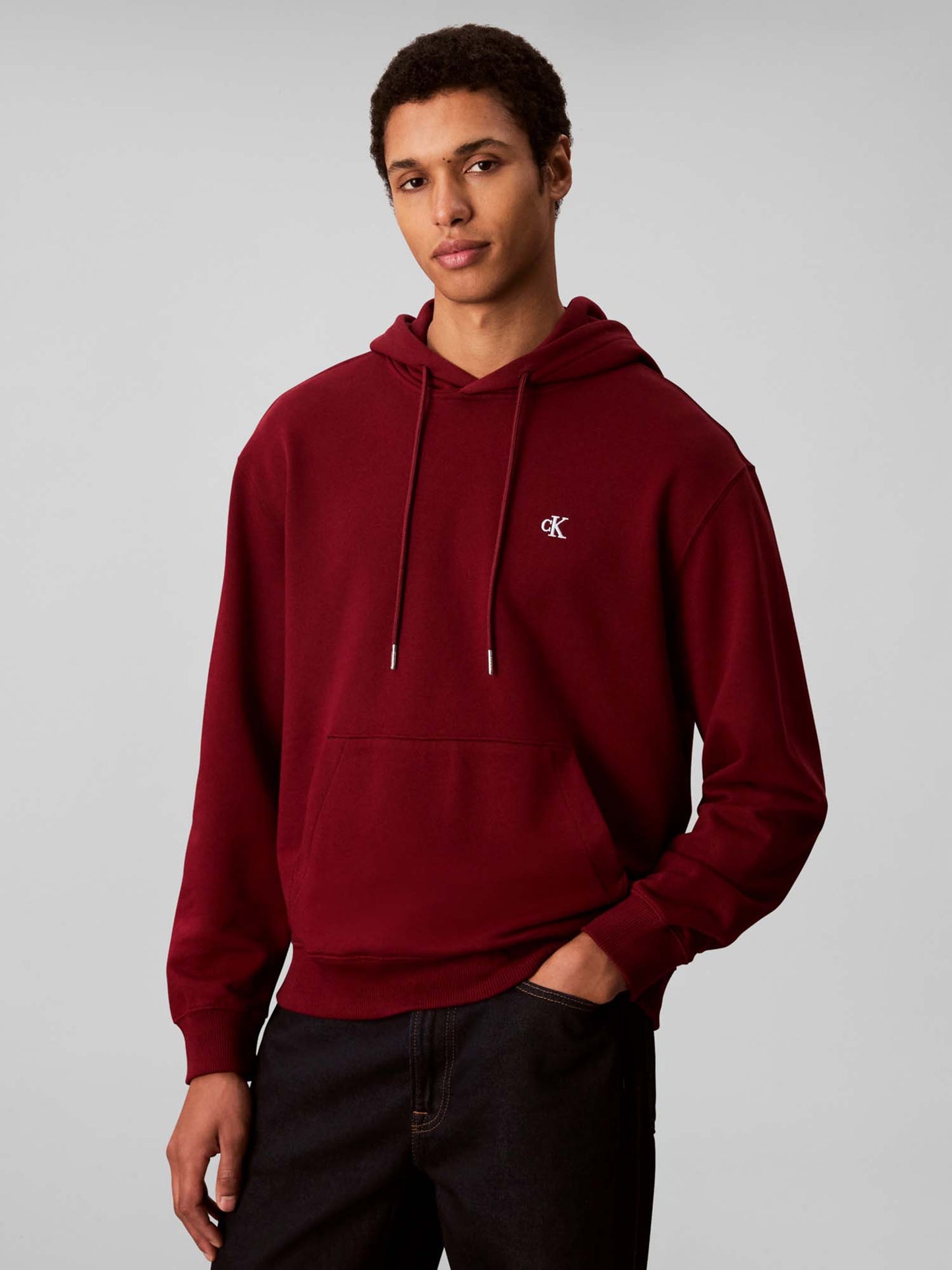 FELPA CON CAPPUCCIO E MONOGRAMMA CALVIN KLEIN DA UOMO BORDEAUX
