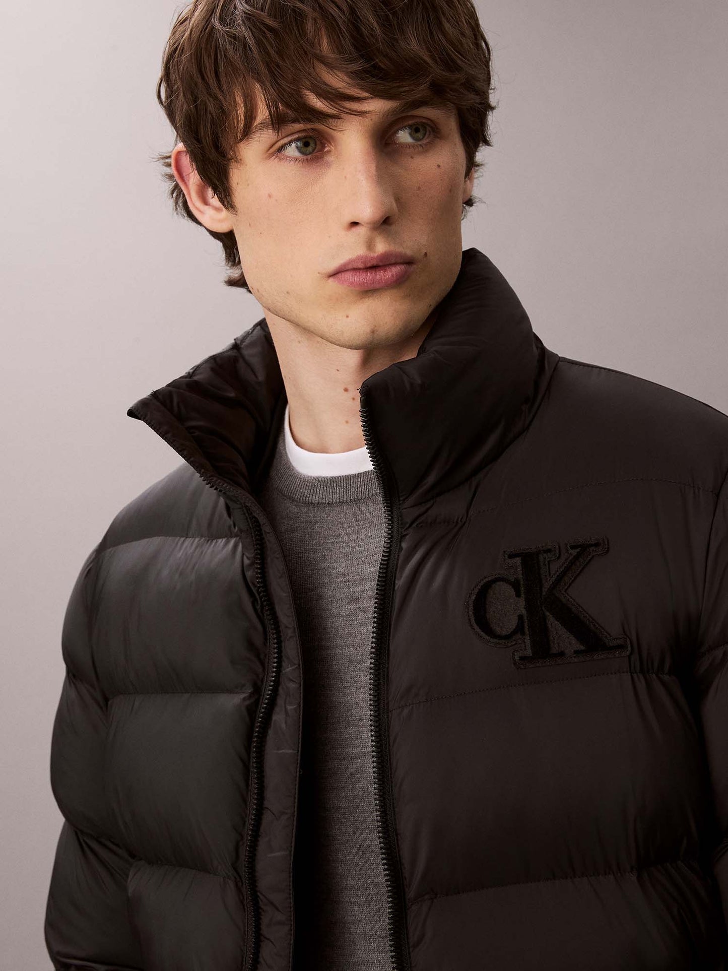CK MONOGRAM PUFFER - NERO