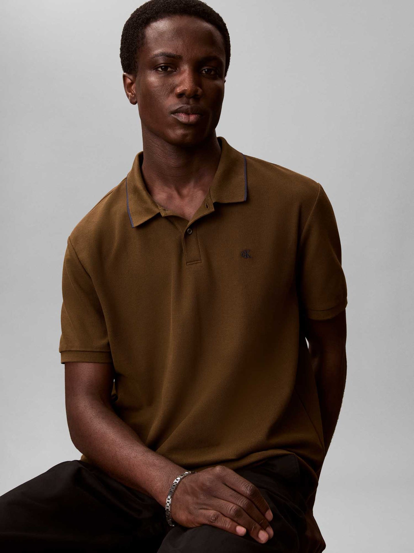 Polo verde da uomo Calvin Klein in cotone piqué refined