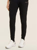 pantaloni-freddy-core-neri-unisex-con-polsini-e-dettaglio-logo