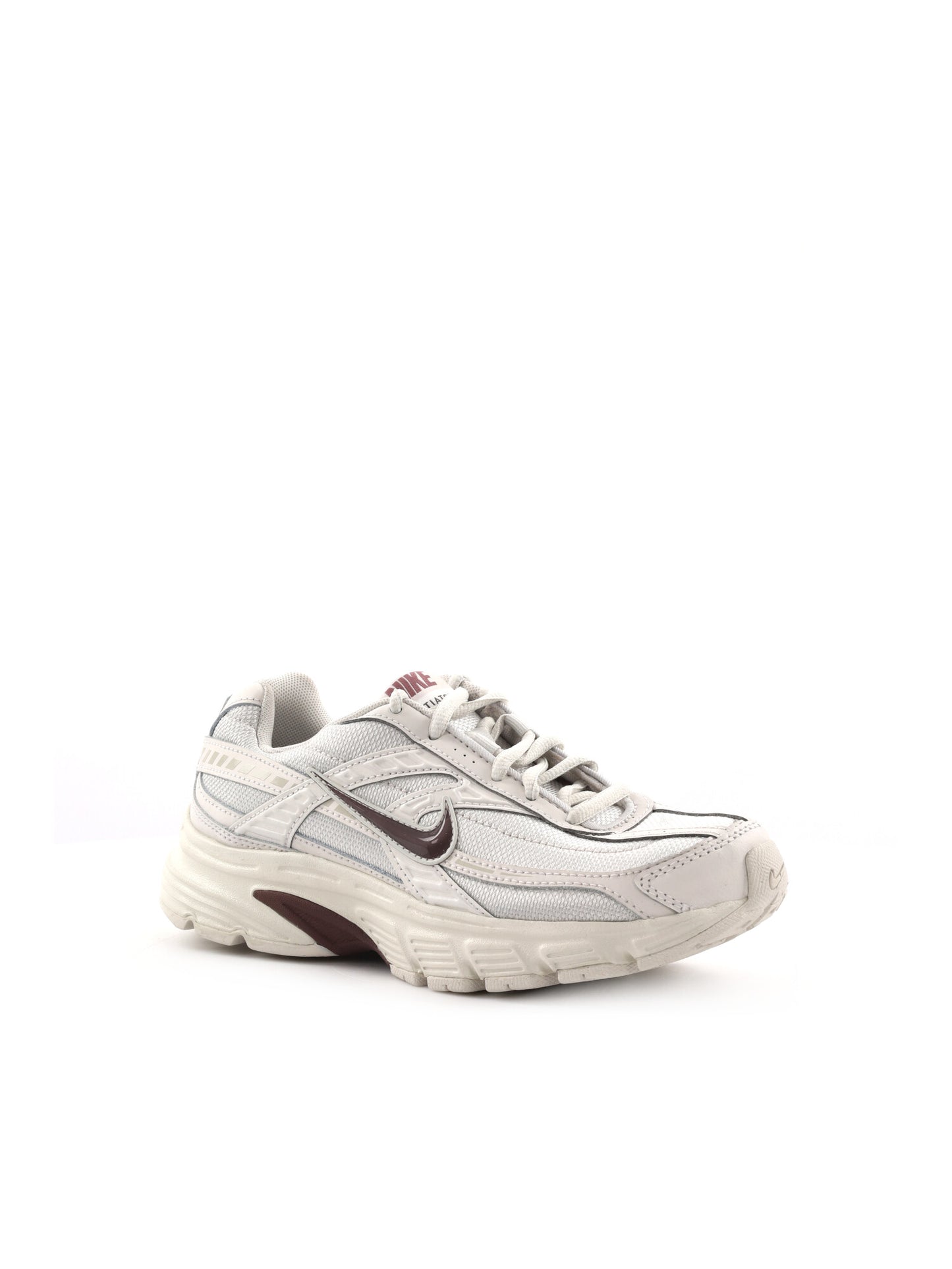 Sneakers Nike Initiator da donna in argento, stile sportivo e moderno
