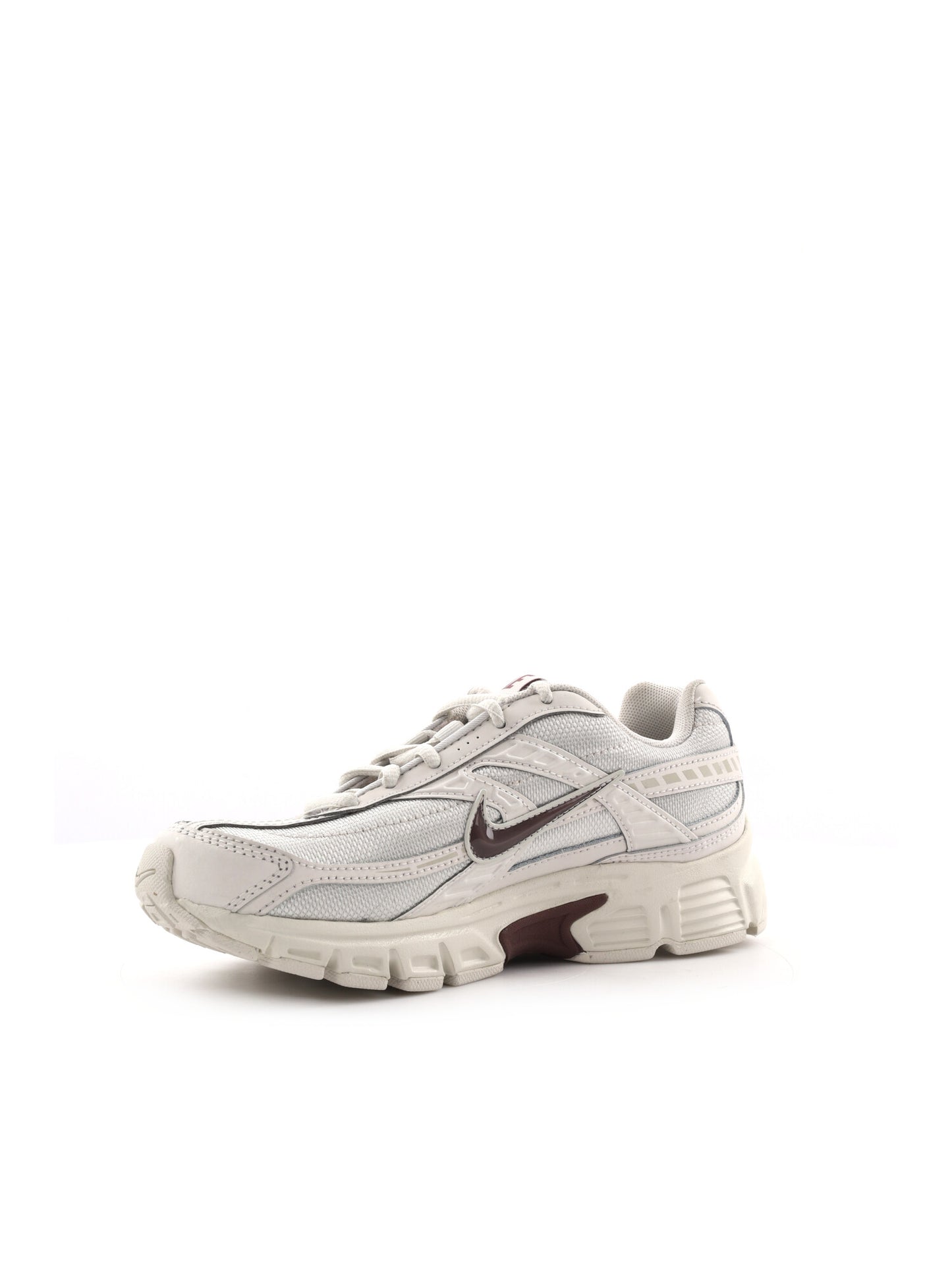 Sneakers Nike Initiator da donna in argento, stile sportivo e moderno