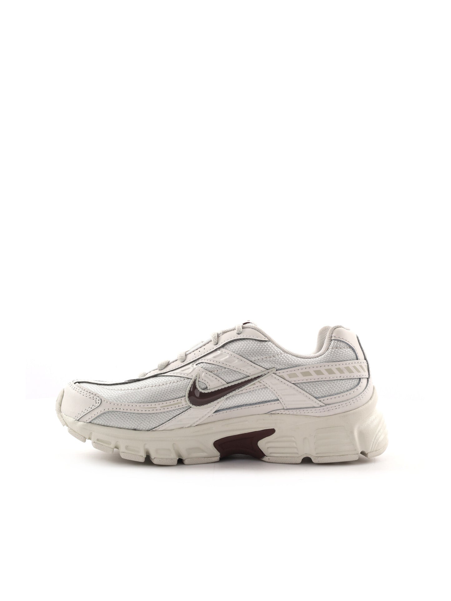 Sneakers Nike Initiator da donna in argento, stile sportivo e moderno