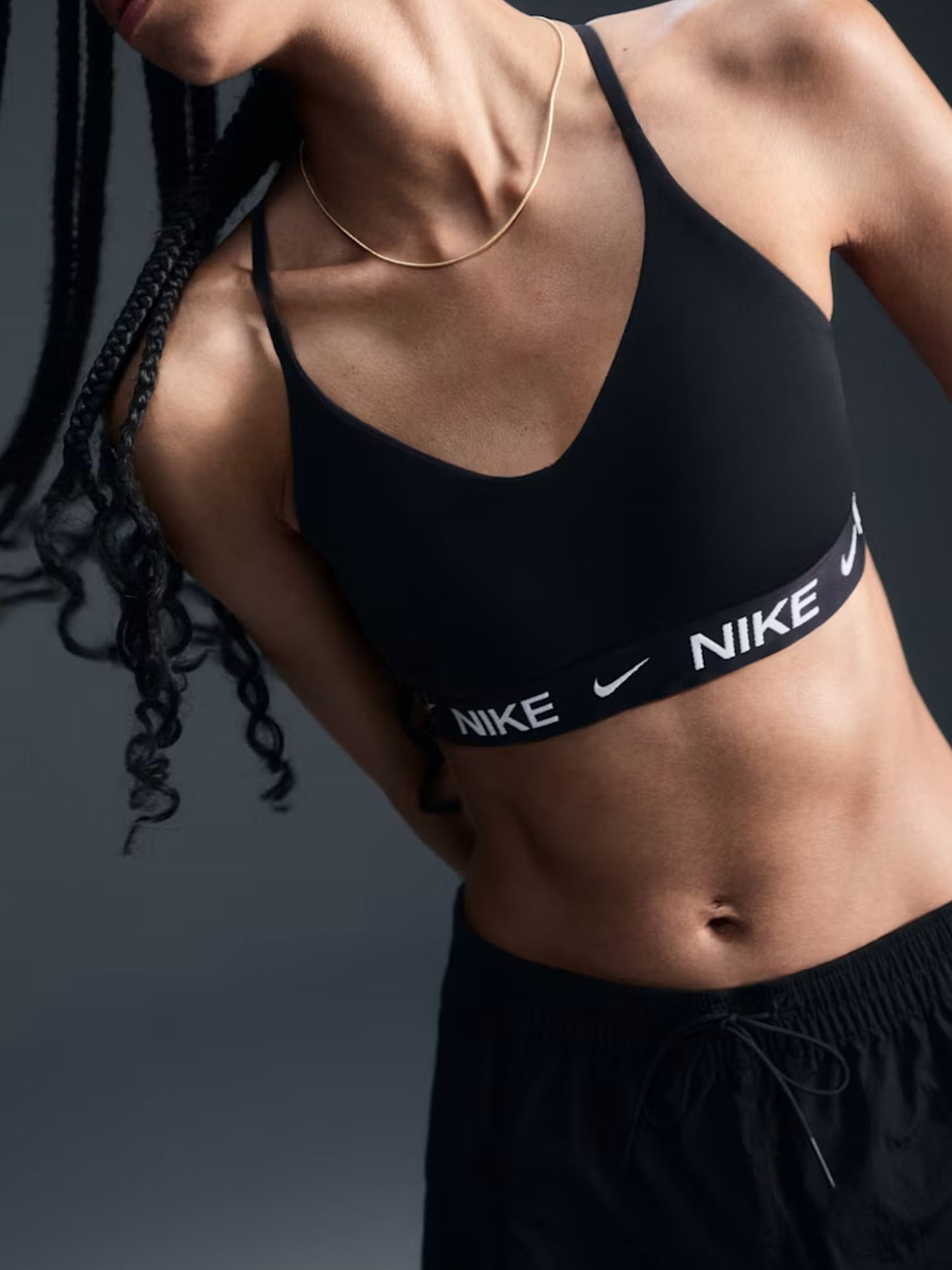 Nike Indy, top da donna nero ideale per training