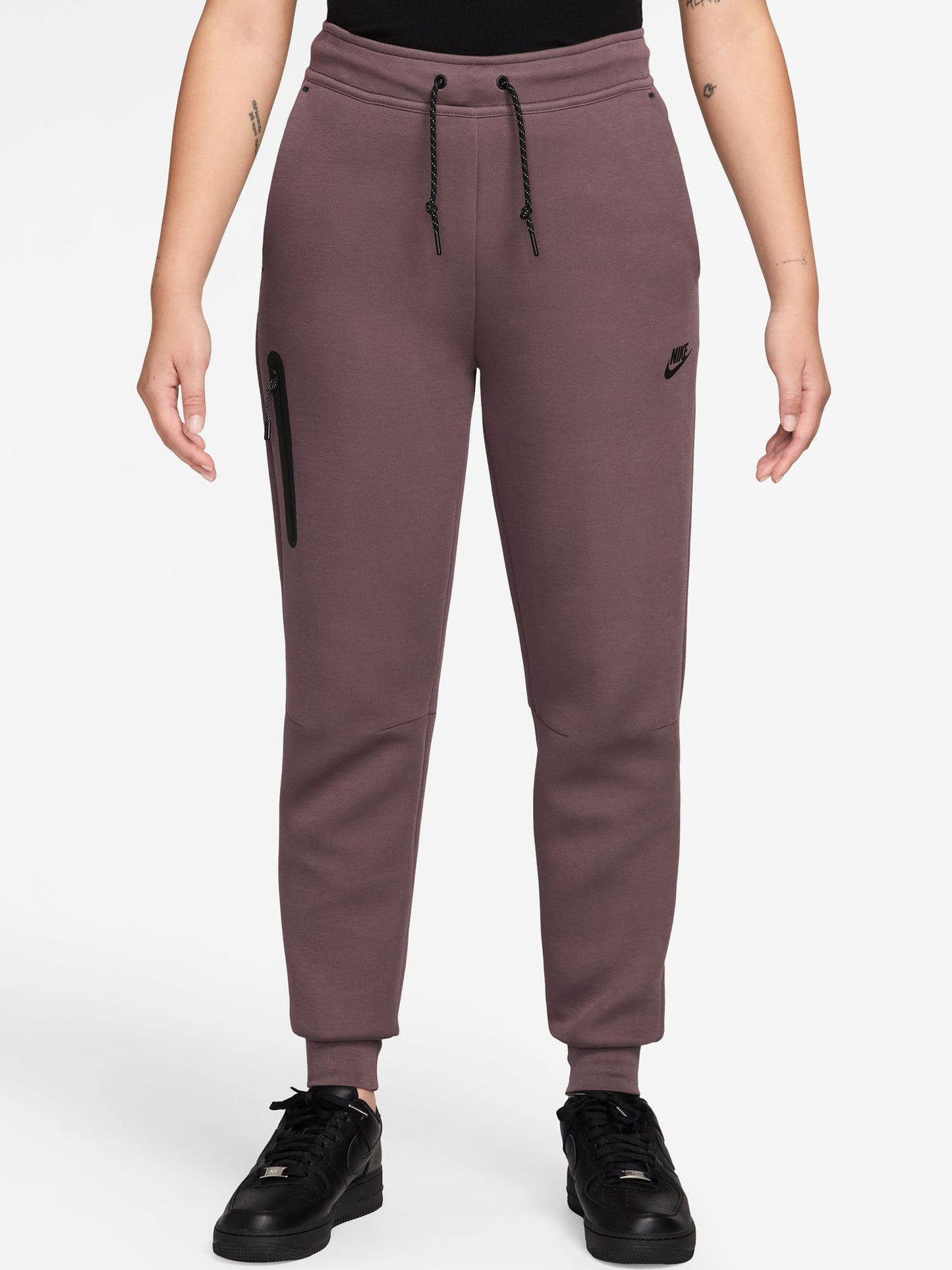 Pantaloni Nike Tech Fleece da donna in tonalità viola