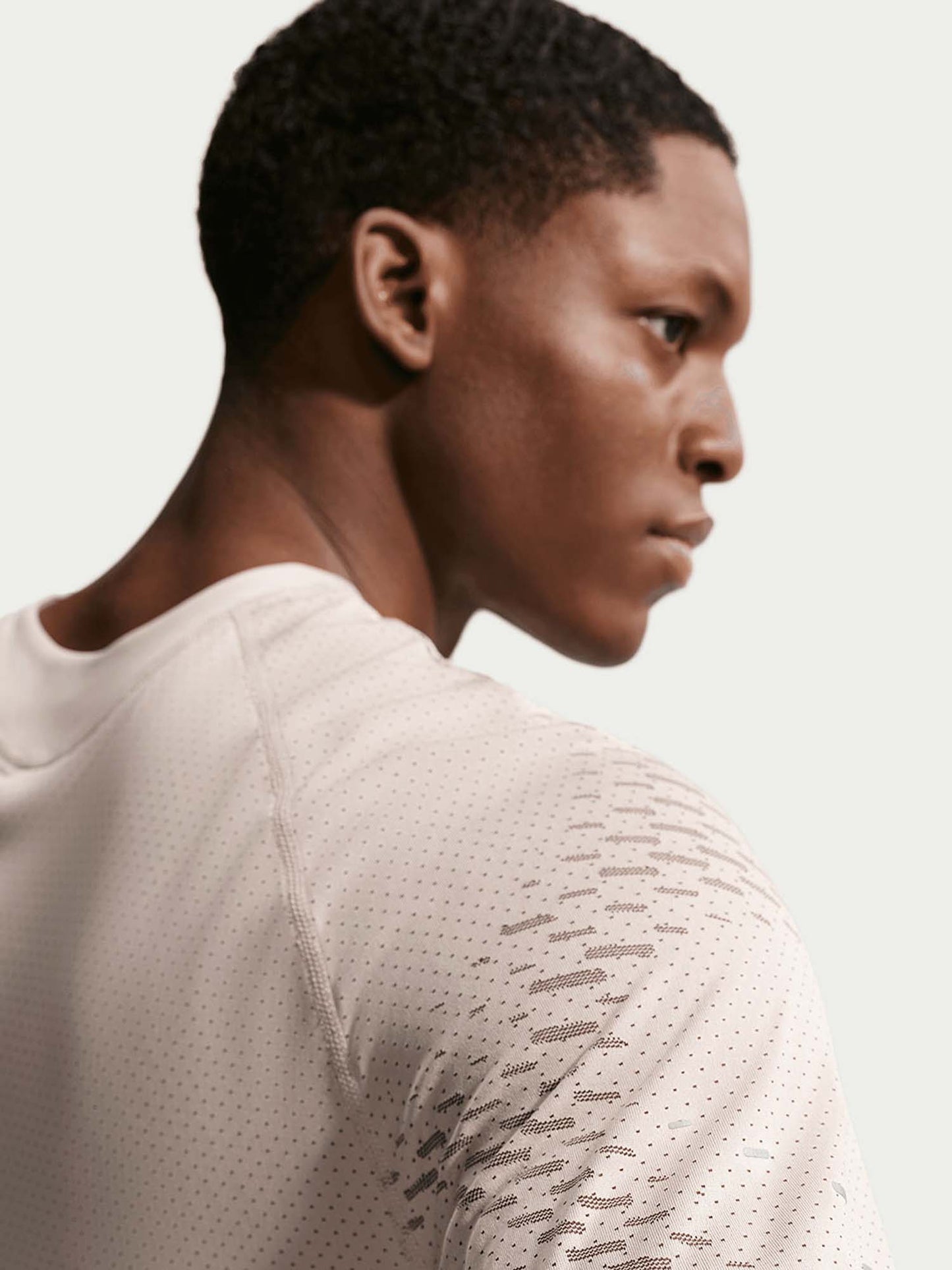 Nike Stride Plus t-shirt running uomo crema a maniche corte