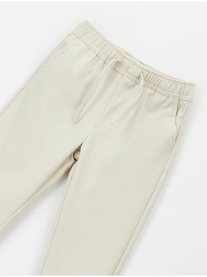 Pantalone beige da bambino unisex Ido per primavera estate