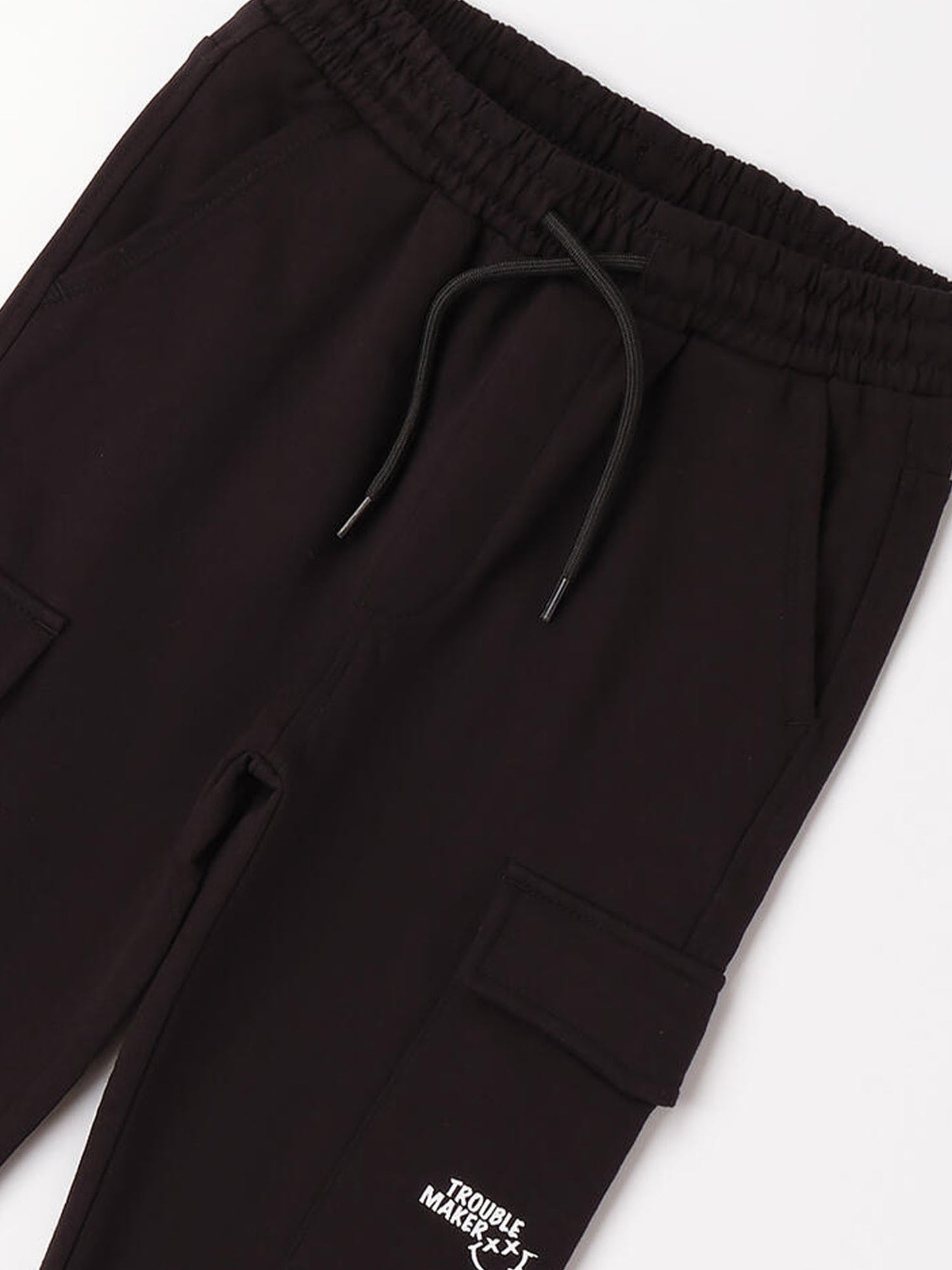 Pantaloni cargo felpati da bambino unisex in nero Ido