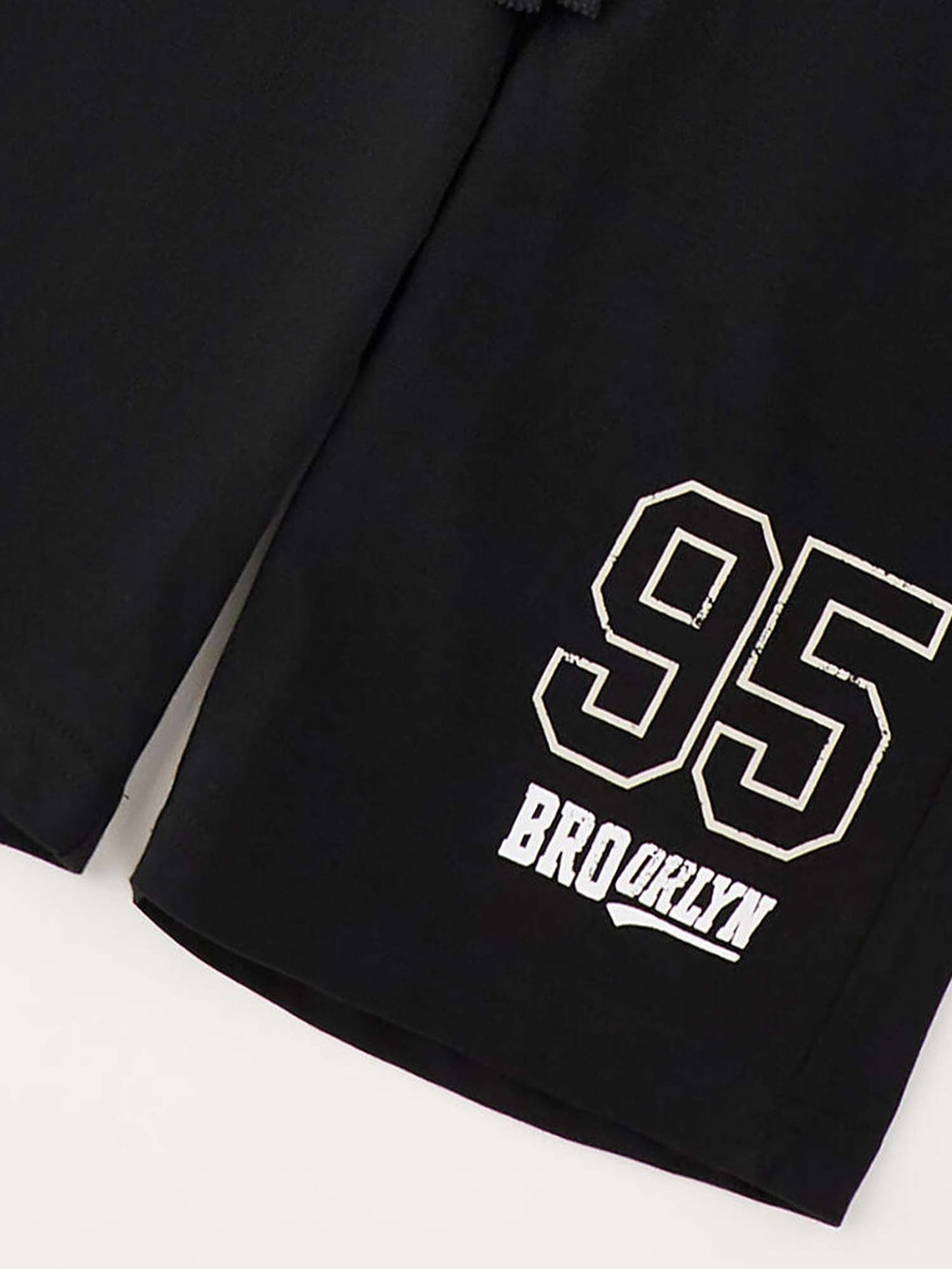 Bermuda unisex bambino Ido in nero, perfetti per l’estate