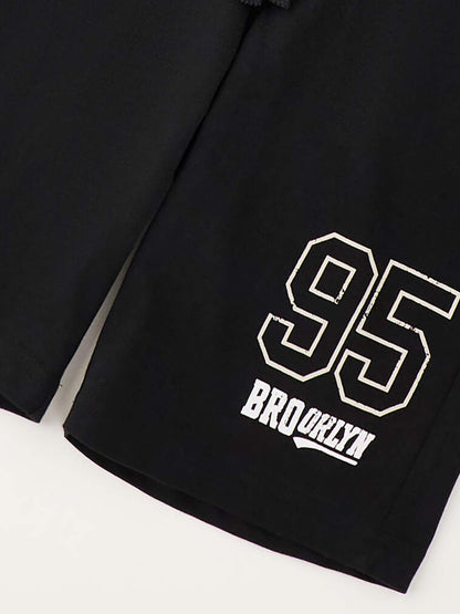 Bermuda unisex bambino Ido in nero, perfetti per l’estate