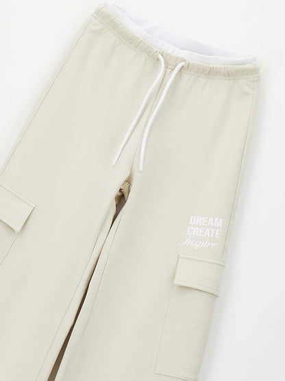 Pantaloni beige unisex bambino Ido per la primavera-estate