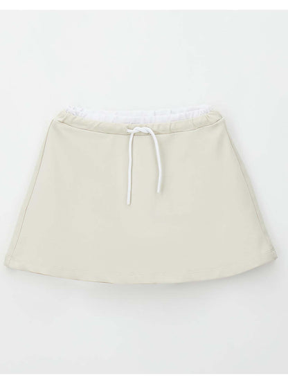 Gonna beige da bambina unisex per la primavera estate by Ido