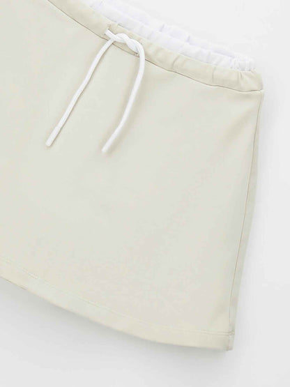 Gonna beige da bambina unisex per la primavera estate by Ido