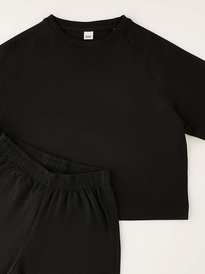 Ido tuta unisex bambino in nero, modello comodo e versatile
