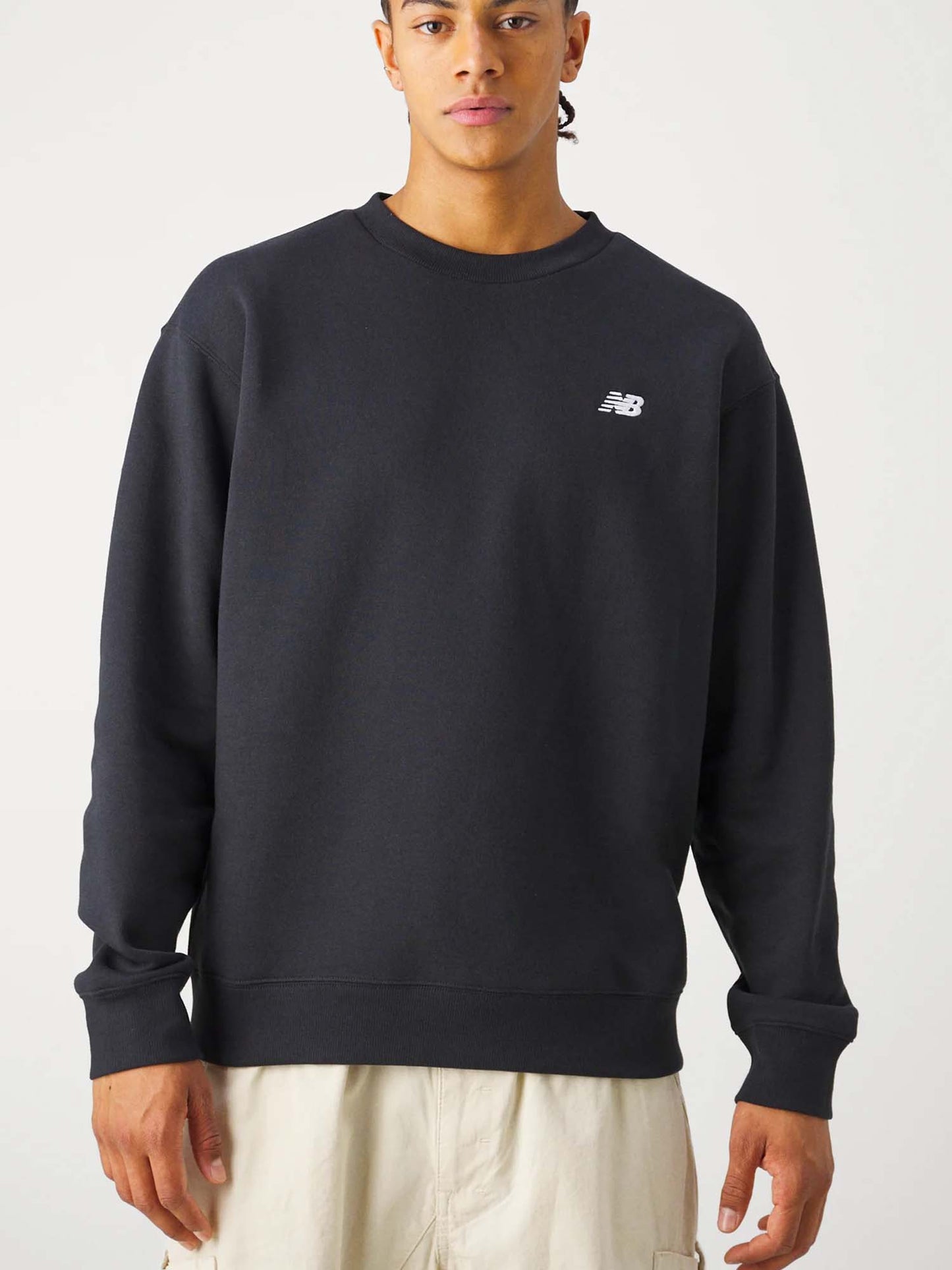 Felpa New Balance Sport Essentials uomo nera in French Terry