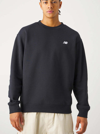 Felpa New Balance Sport Essentials uomo nera in French Terry