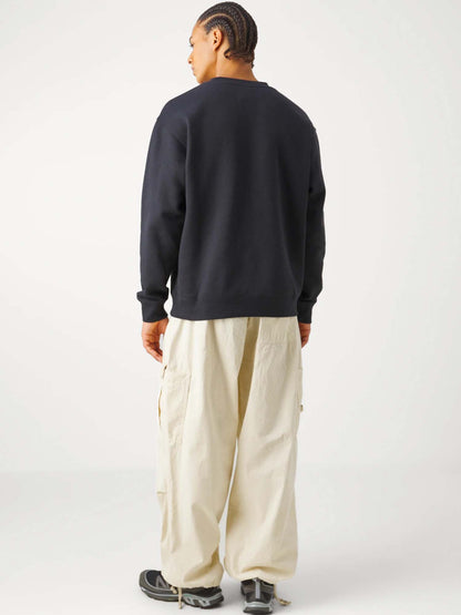 Felpa New Balance Sport Essentials uomo nera in French Terry