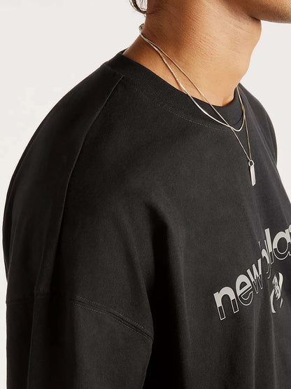 New Balance Trackside, t-shirt maniche corte da uomo nera