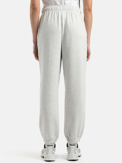 Pantaloni jogger Sport Essentials in French Terry grigio donna