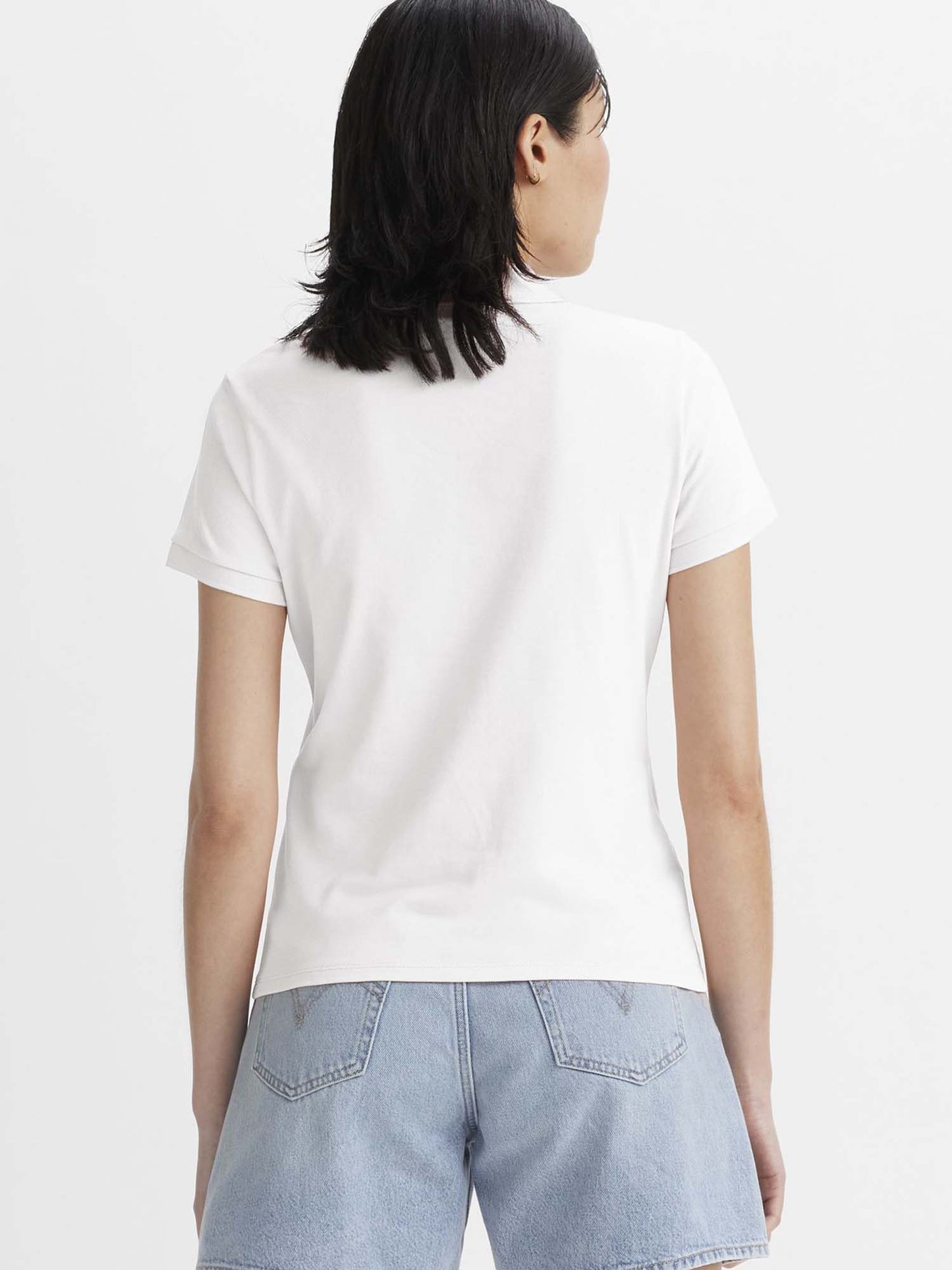 Polo slim donna Levi's bianca, stile essenziale e versatile