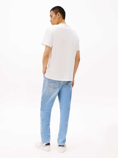 T-SHIRT BADGE TOMMY JEANS UOMO BIANCO