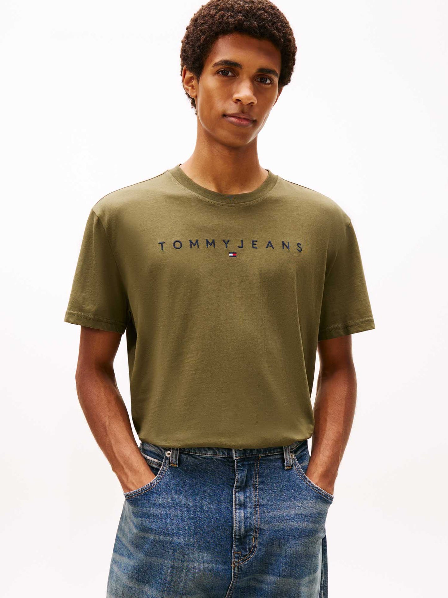T-shirt verde Tommy Jeans con logo lineare da uomo