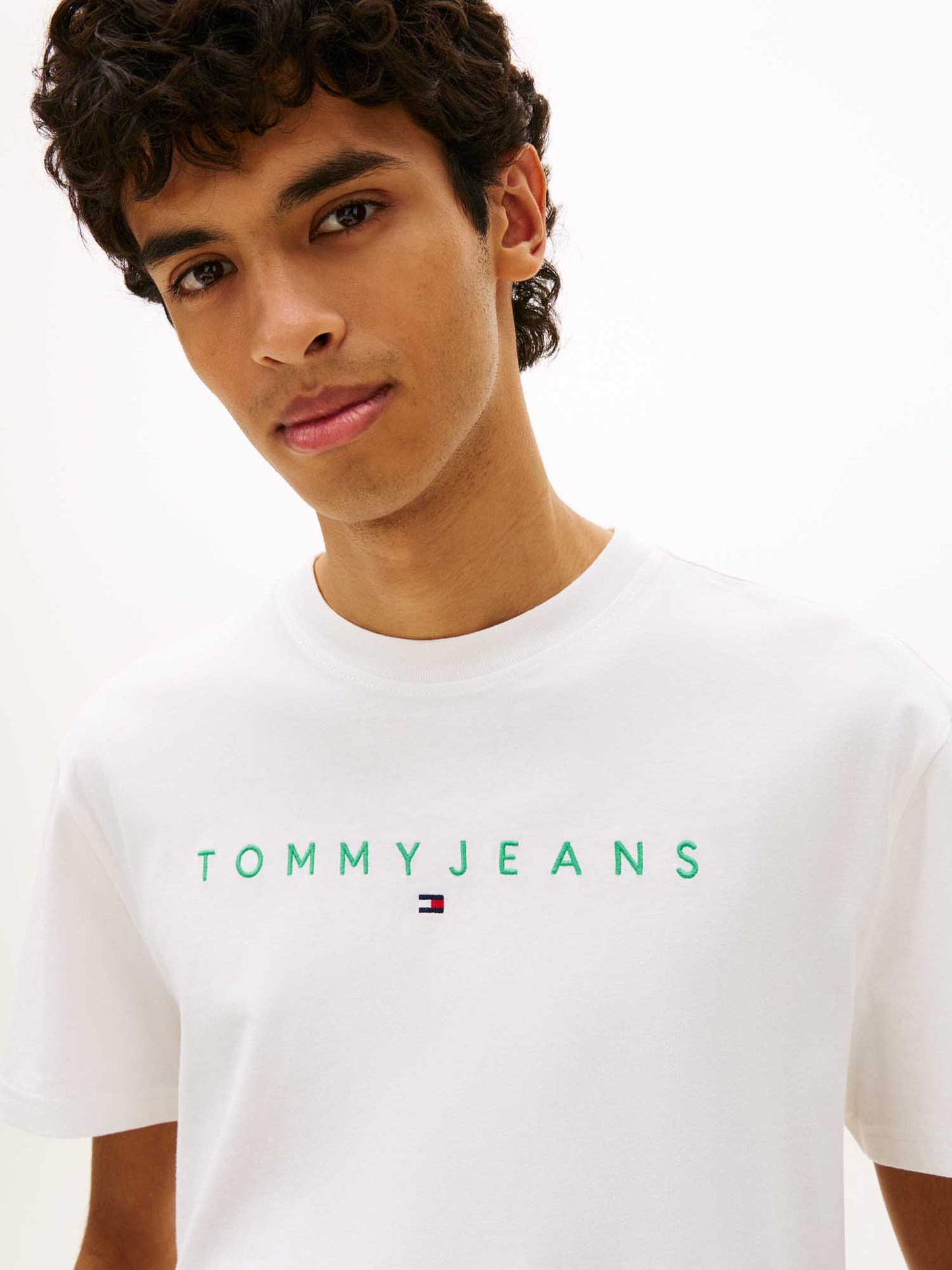 T-SHIRT BIANCA-VERDE TOMMY JEANS CON LOGO LINEARE DA UOMO