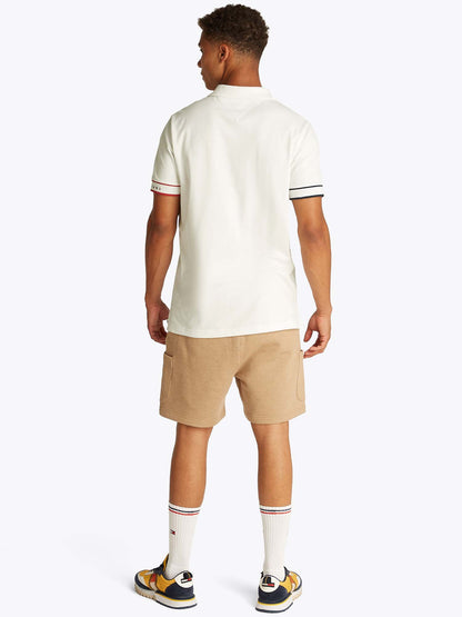 POLO SLIM FLAG TOMMY JEANS UOMO ECRU'