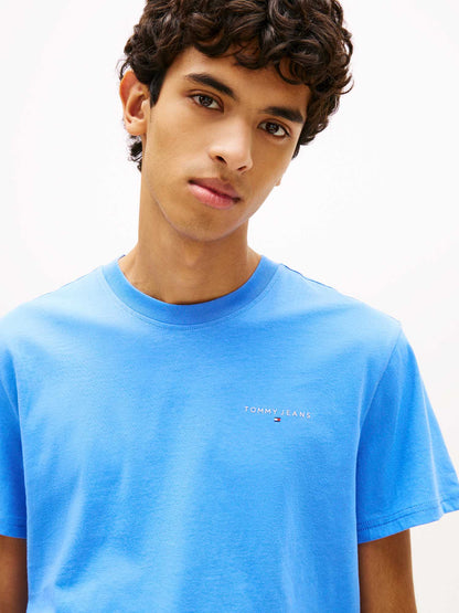 T-shirt girocollo slim fit azzurra Tommy Jeans con logo lineare