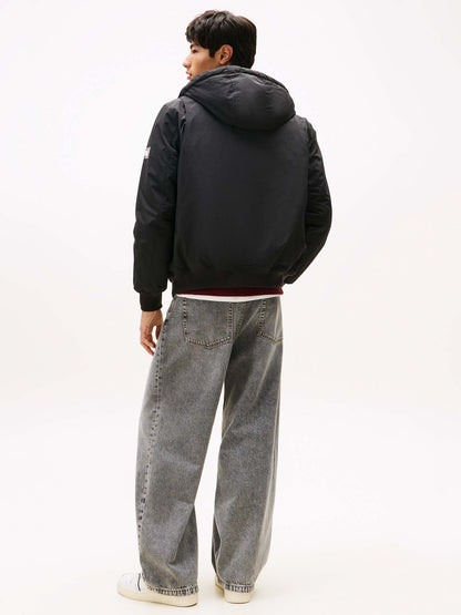 BOMBER CON CAPPUCCIO TOMMY JEANS DA UOMO NERO
