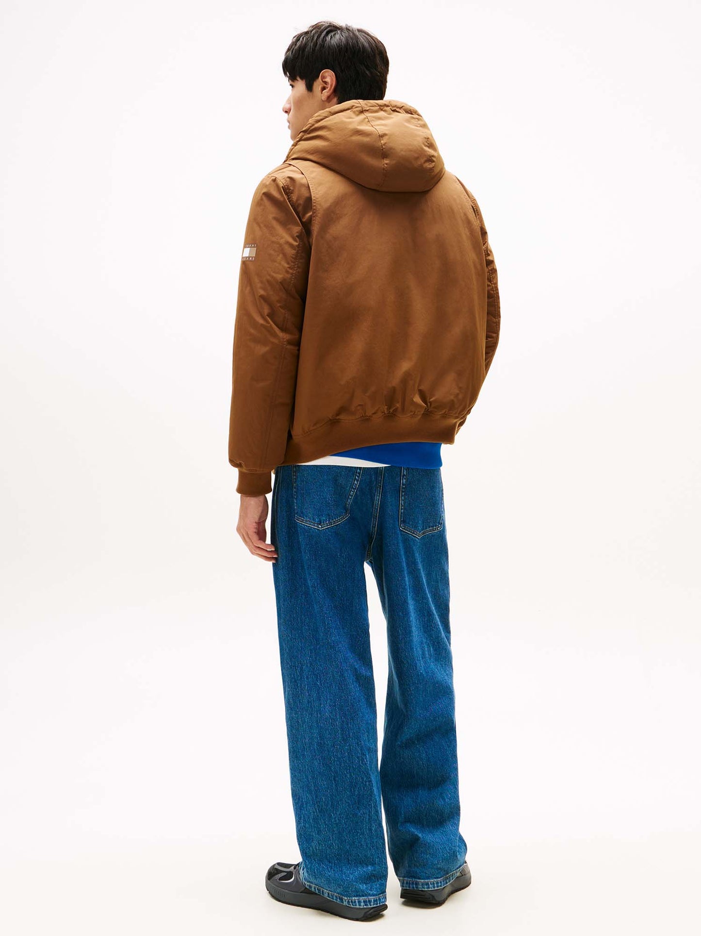 BOMBER CON CAPPUCCIO TOMMY JEANS DA UOMO BISCOTTO