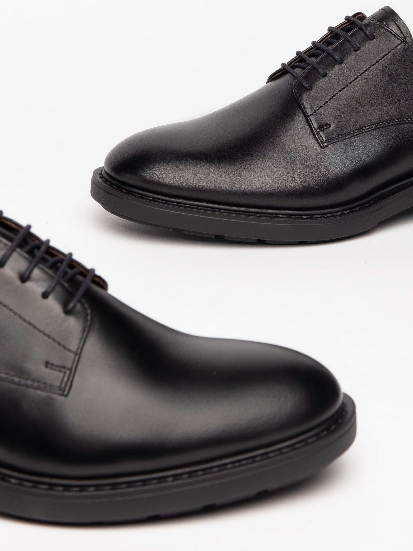 STRINGATA IN PELLE NeroGiardini DA UOMO NERO