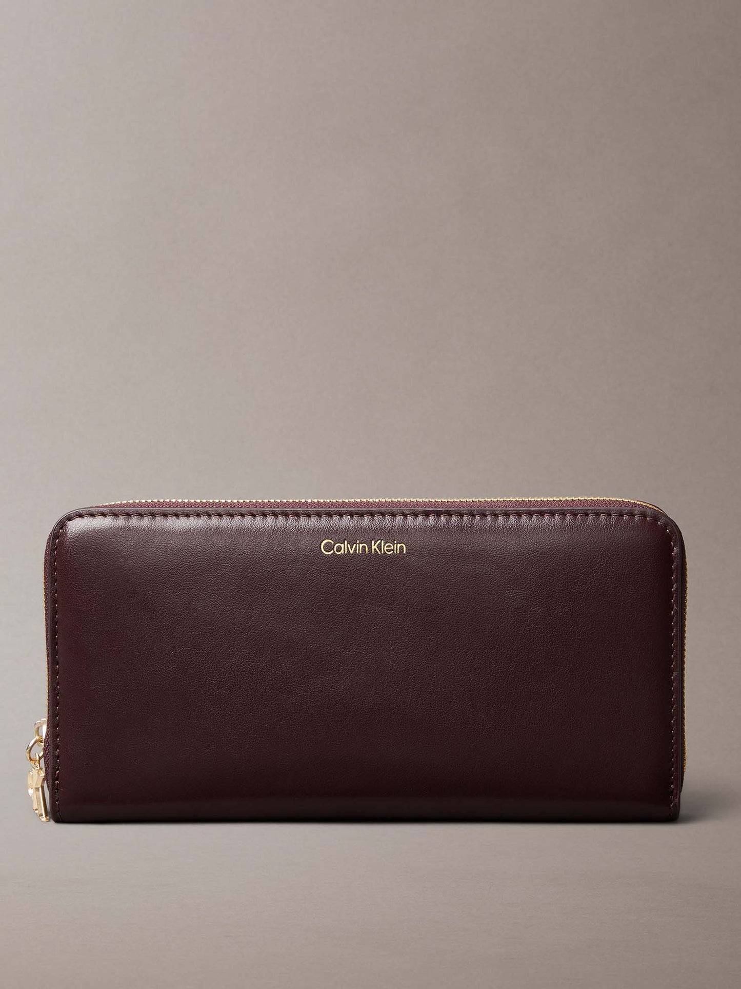 PORTAFOGLI  LARGE ZIP AROUND CALVIN KLEIN DONNA BORDEAUX