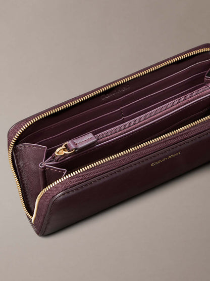 PORTAFOGLI  LARGE ZIP AROUND CALVIN KLEIN DONNA BORDEAUX