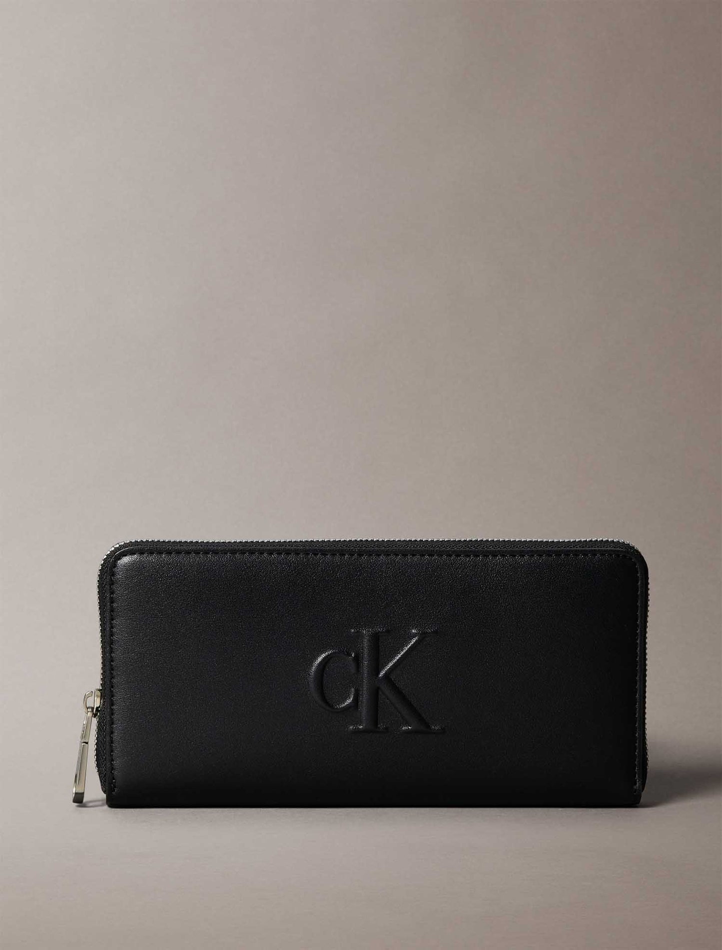 CK SCULPTED ZIP AROU