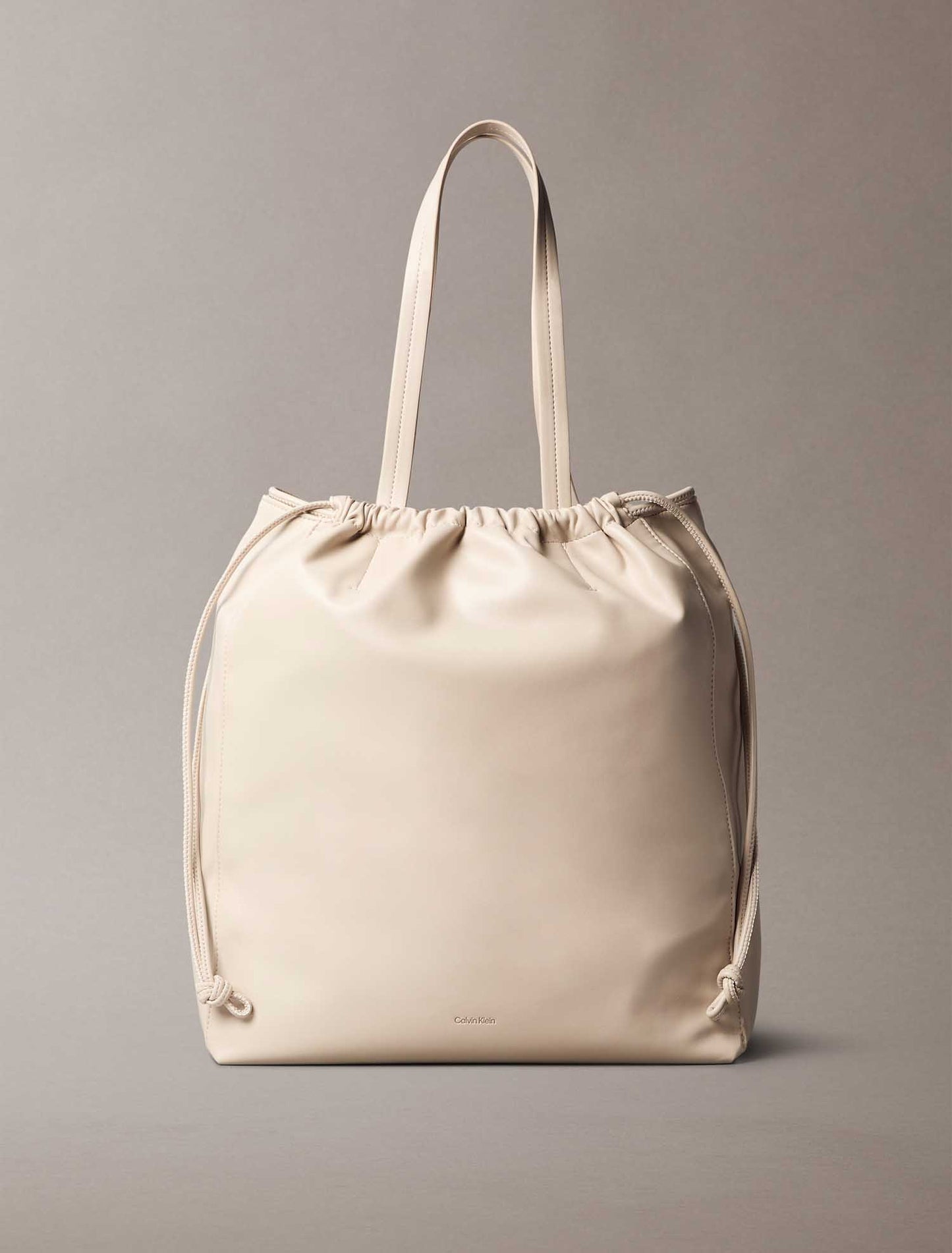 CK DRAWSTRING TOTE