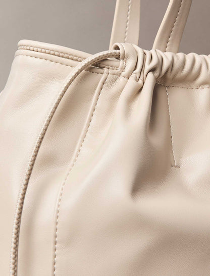 CK DRAWSTRING TOTE
