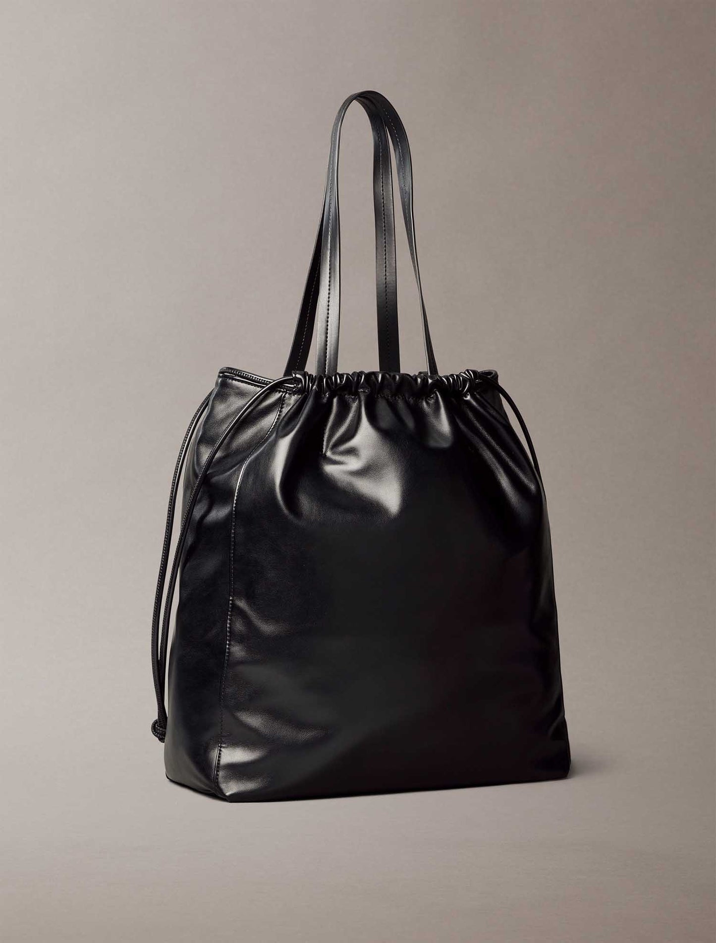 CK DRAWSTRING TOTE