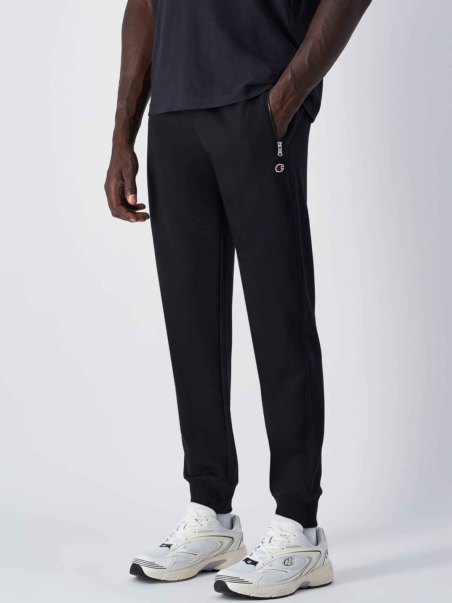 Pantaloni joggers da uomo Champion nere con zip e vita elastica