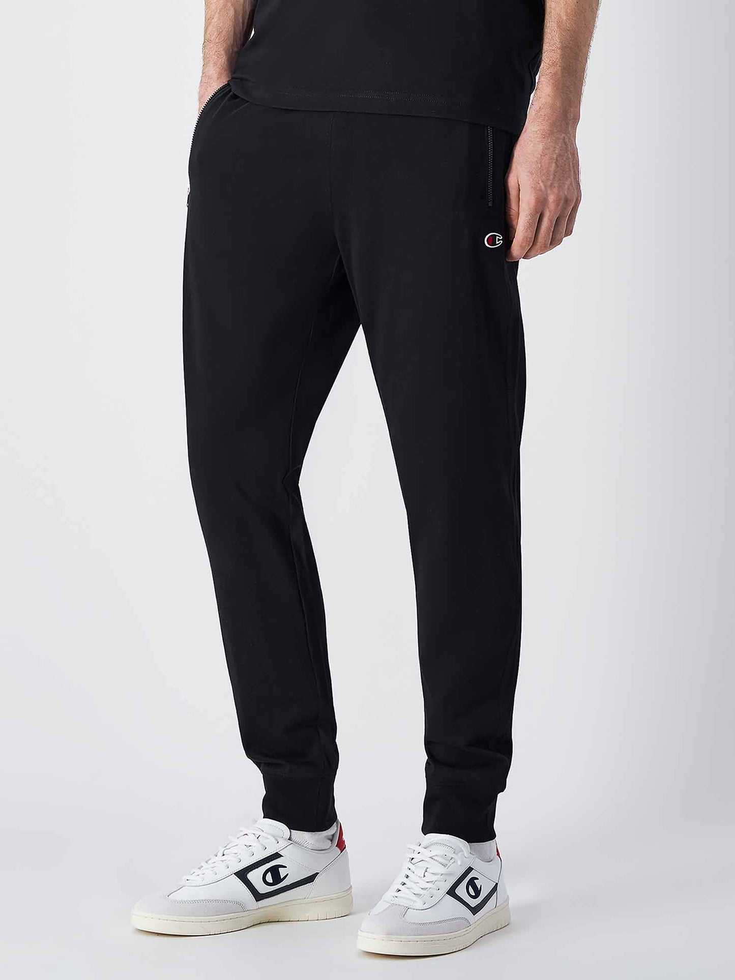 Pantaloni da uomo Champion neri con tasche zip e vita elasticizzata