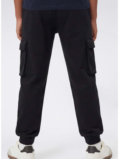 Pantaloni cargo Champion da bambino in nero unisex