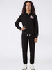 tuta-nera-champion-da-bambina-unisex-per-la-primavera